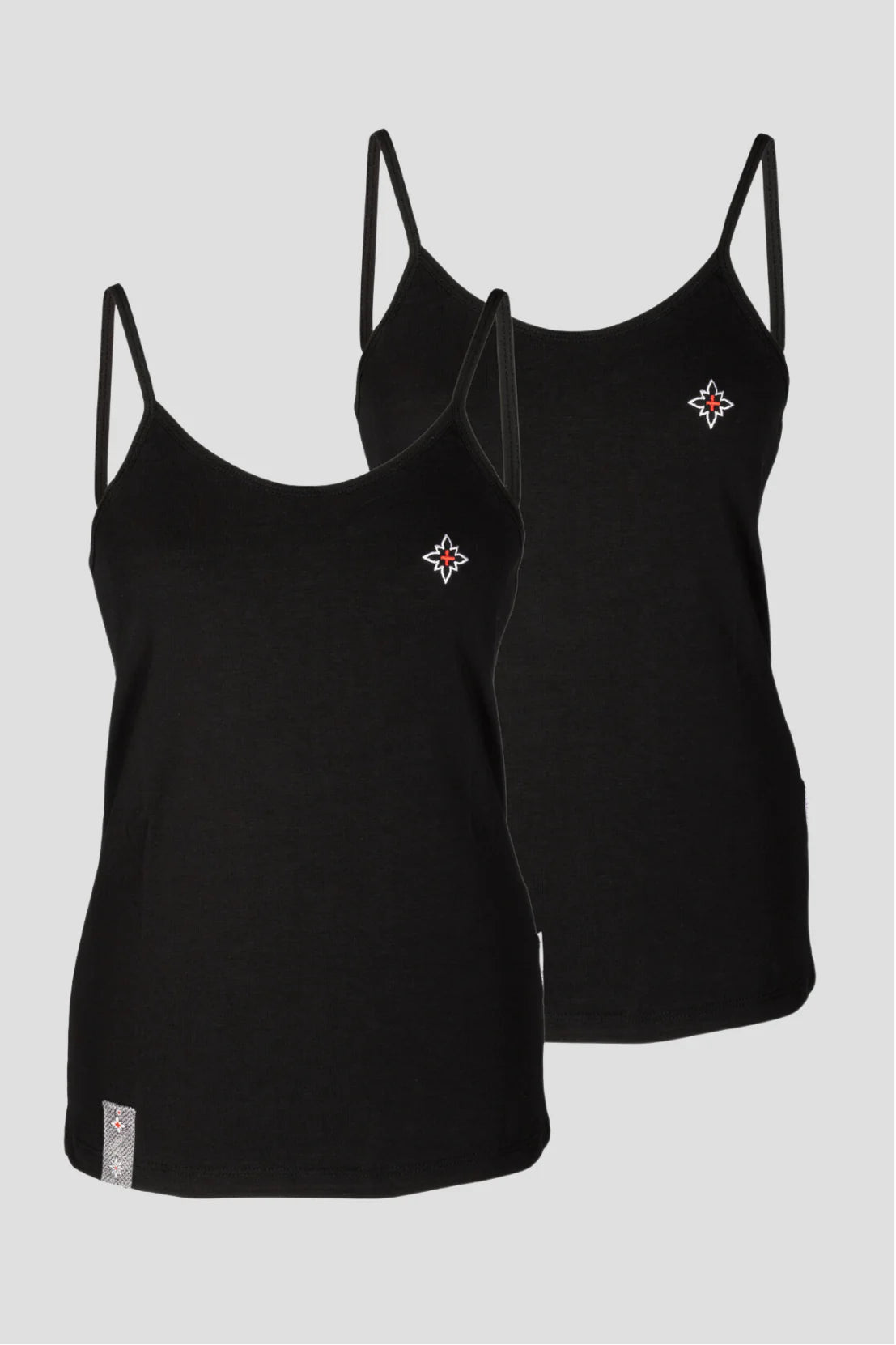 Damen Edelweiss Spaghetti-Top von Edelvetica, ein elegantes und sommerliches Kleidungsstück. Dieses Top zeichnet sich durch ein feines Edelweiss-Muster aus und bietet einen leichten und luftigen Tragekomfort. Ideal für warme Tage, kombiniert es schweizerische Tradition mit einem femininen und modernen Stil.
