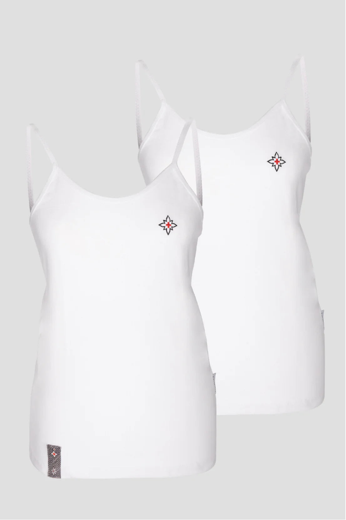 Damen Edelweiss Spaghetti-Top von Edelvetica, ein elegantes und sommerliches Kleidungsstück. Dieses Top zeichnet sich durch ein feines Edelweiss-Muster aus und bietet einen leichten und luftigen Tragekomfort. Ideal für warme Tage, kombiniert es schweizerische Tradition mit einem femininen und modernen Stil
