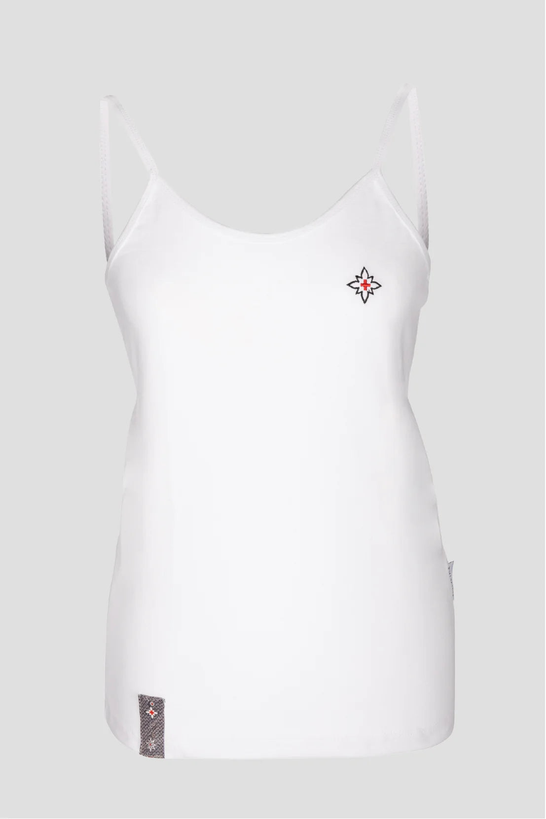 Damen Edelweiss Spaghetti-Top von Edelvetica, ein elegantes und sommerliches Kleidungsstück. Dieses Top zeichnet sich durch ein feines Edelweiss-Muster aus und bietet einen leichten und luftigen Tragekomfort. Ideal für warme Tage, kombiniert es schweizerische Tradition mit einem femininen und modernen Stil