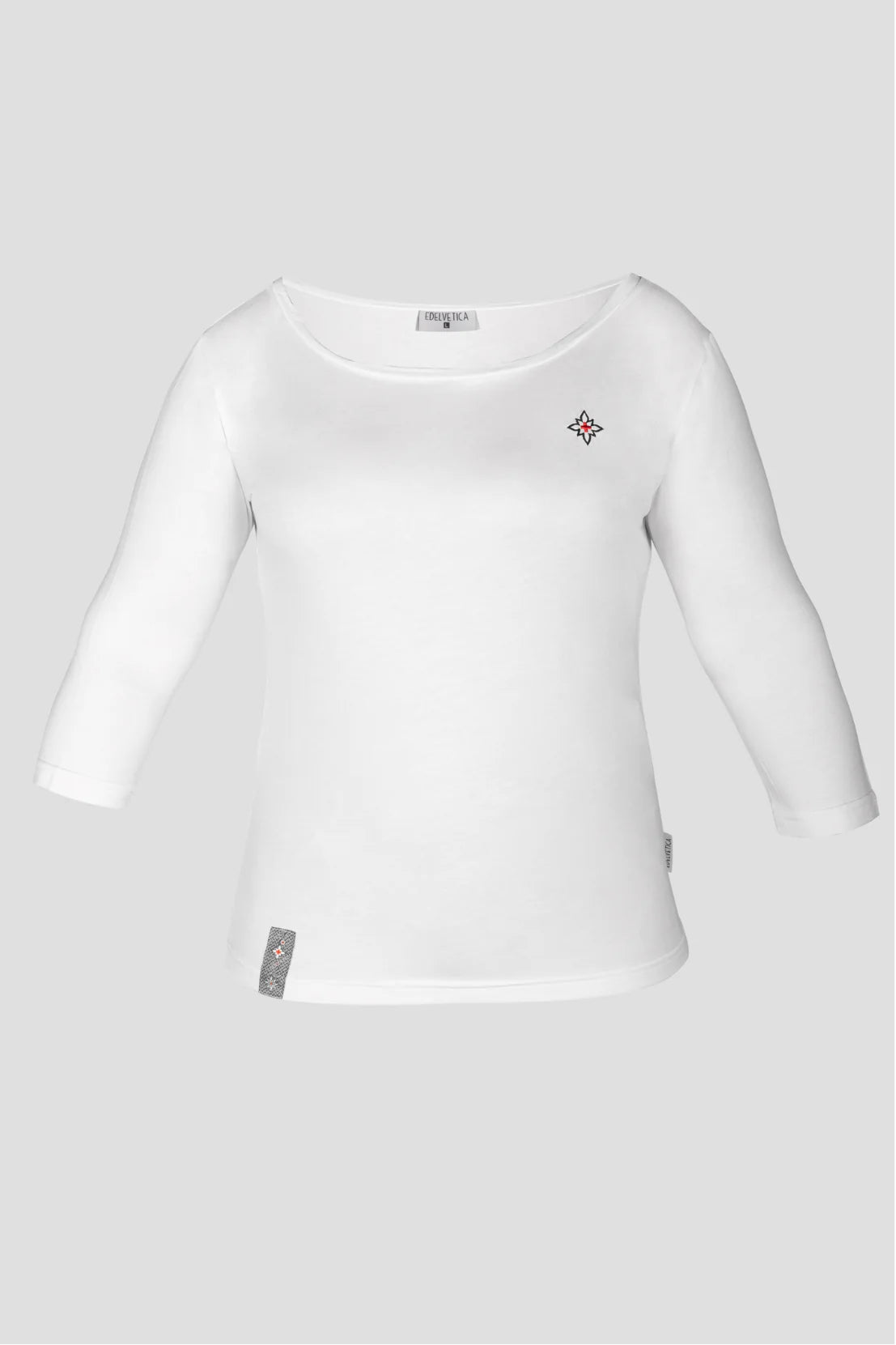 Damen Edelweiss U-Boot-Shirt von Edelvetica, ein modisches und bequemes Kleidungsstück. Dieses Shirt zeichnet sich durch seinen U-Boot-Ausschnitt aus und ist mit einem dezenten Edelweiss-Muster verziert. Es kombiniert Eleganz mit einem Hauch von Schweizer Tradition, ideal für einen entspannten, aber stilvollen Look.